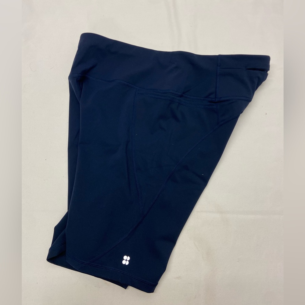 Sweaty Betty Dark Blue size 16 bike shorts, 9” inseam, with stash pockets